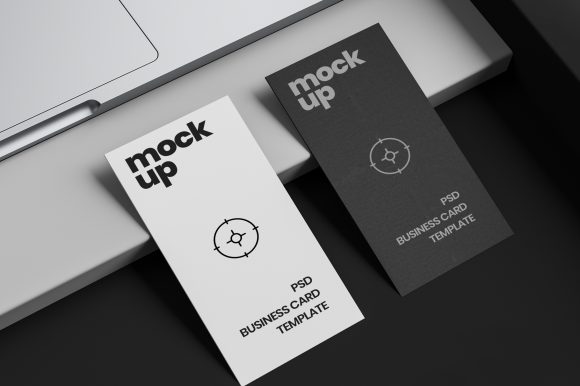 Vertical Business Card Mockups on Desk - GraphicXtreme
